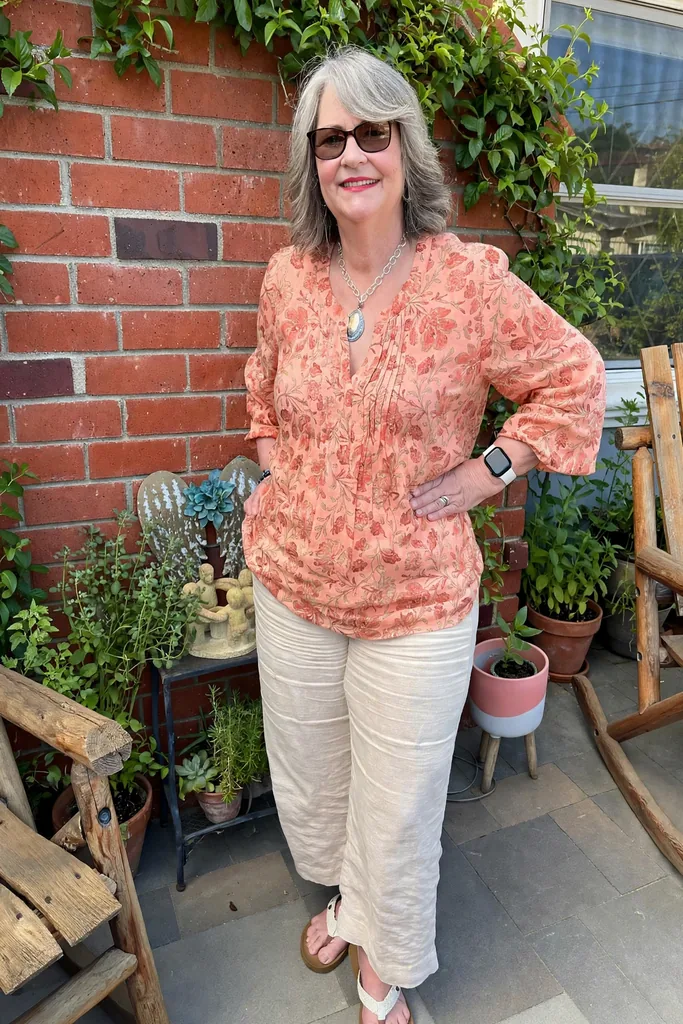 coral-floral-tunic-with-ecru-pants